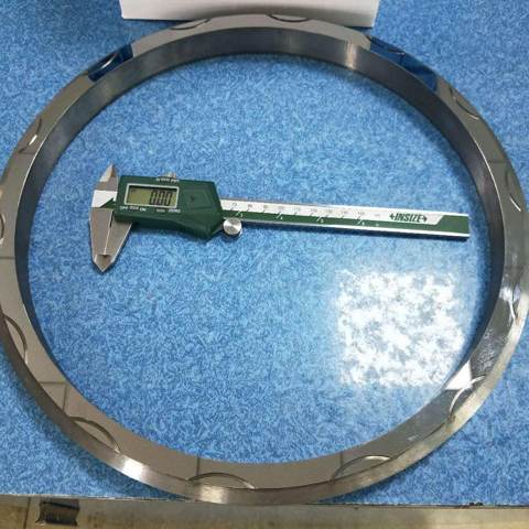 Anillo de sellado junto a un calibre